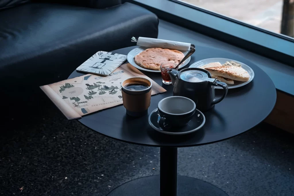 Pedestal black coffee table and chairs food